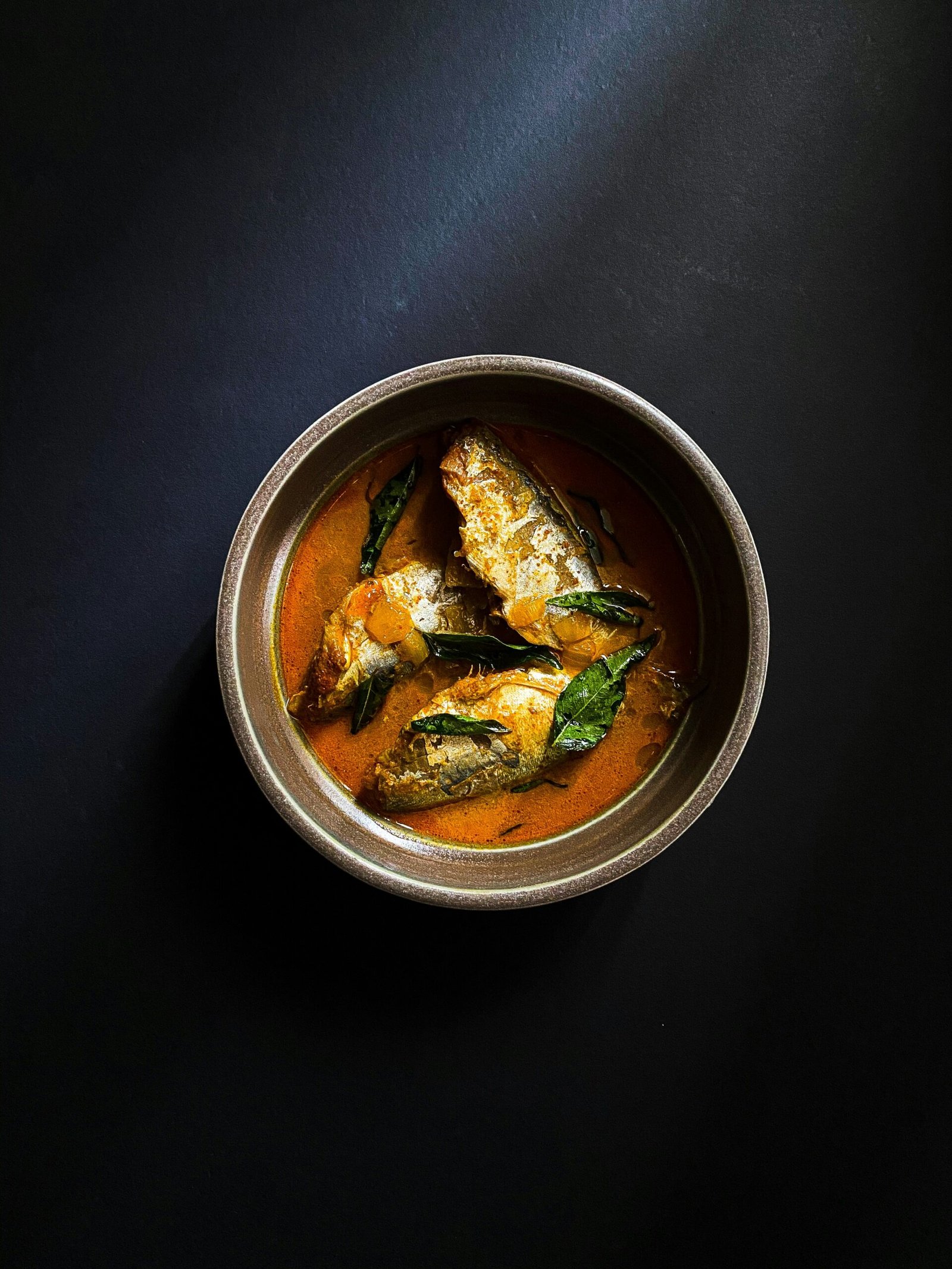 cooked food in round stainless steel bowl